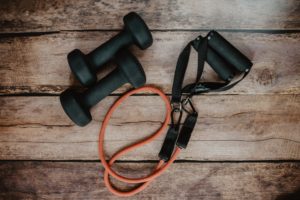 skipping rope and weights on a floor